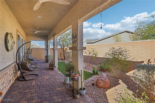 view of patio / terrace with ceiling fan