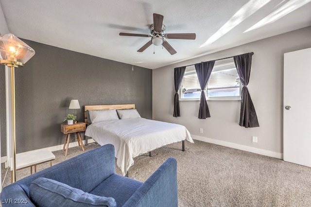 bedroom featuring ceiling fan and carpet flooring