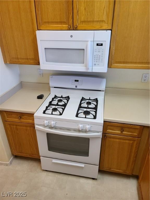 kitchen featuring white appliances