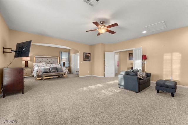 bedroom with ceiling fan and light carpet