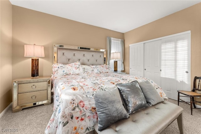 bedroom featuring multiple windows, light carpet, and a closet