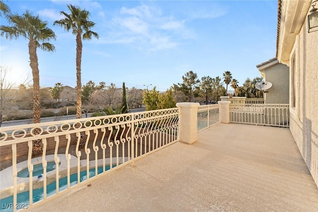 balcony featuring a hot tub