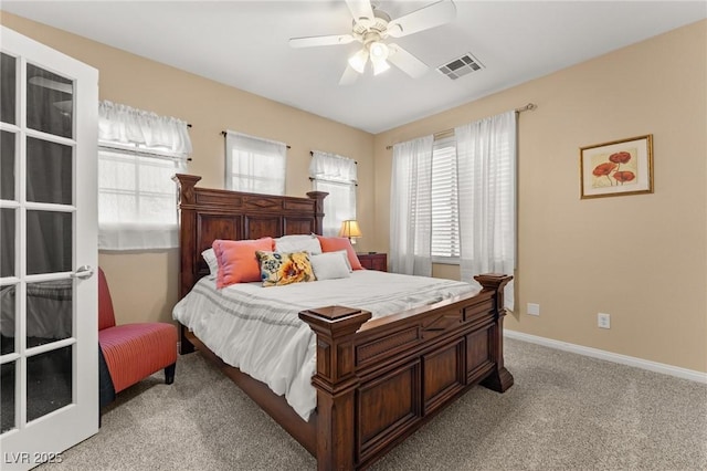 carpeted bedroom with ceiling fan