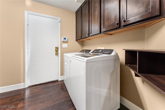 laundry room with cabinets and independent washer and dryer