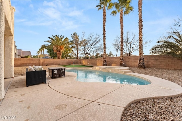 view of swimming pool featuring a patio