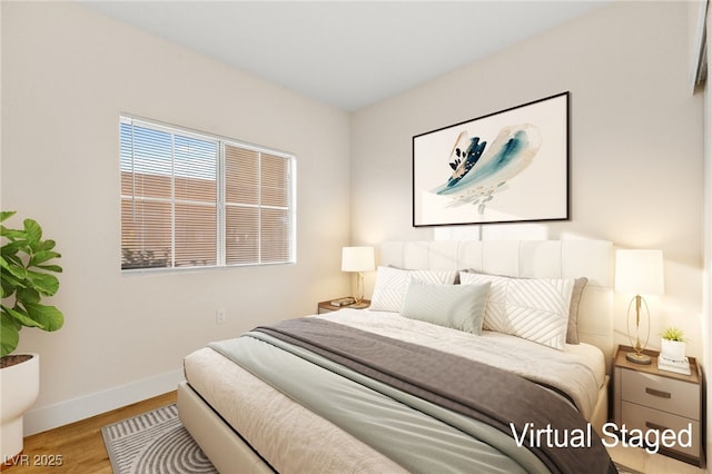 bedroom with light hardwood / wood-style flooring