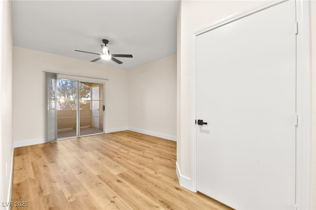 spare room featuring ceiling fan and light hardwood / wood-style floors