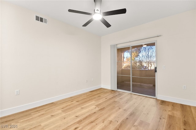 spare room with ceiling fan and light hardwood / wood-style flooring