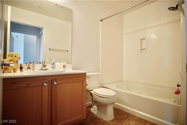 full bathroom featuring vanity, toilet,  shower combination, and tile patterned flooring