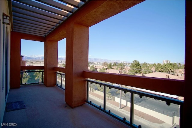 balcony featuring a mountain view