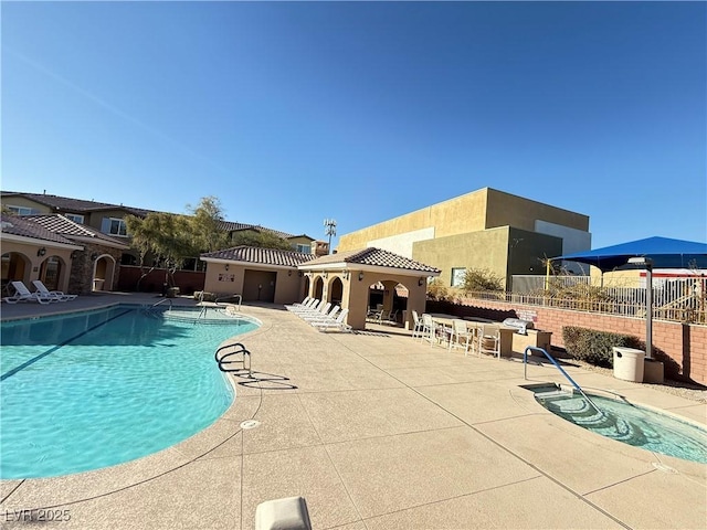 view of swimming pool with a patio area and a gazebo