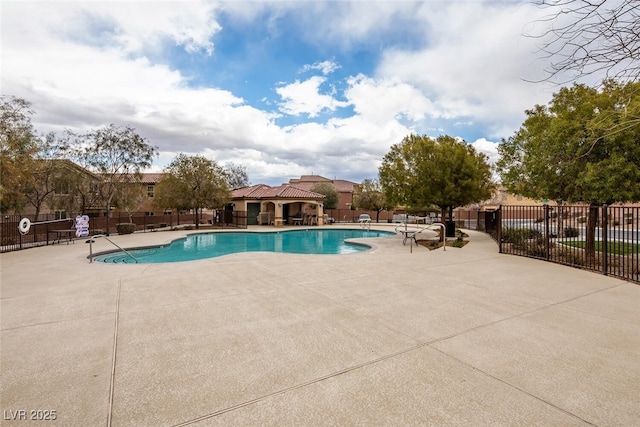 view of swimming pool featuring a gazebo and a patio