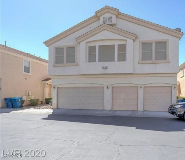 front of property featuring a garage