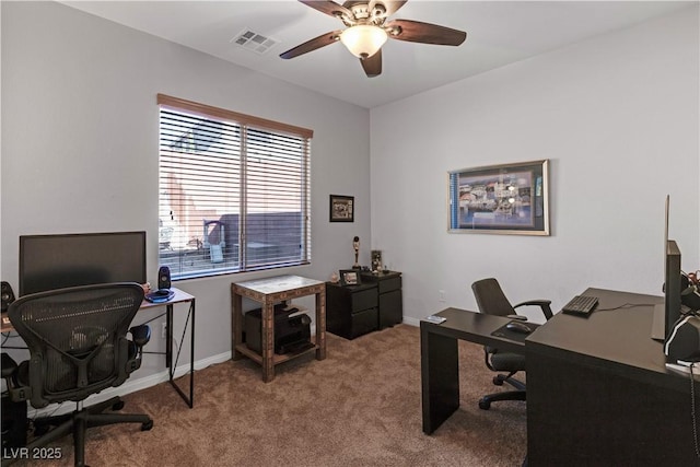 carpeted home office with ceiling fan