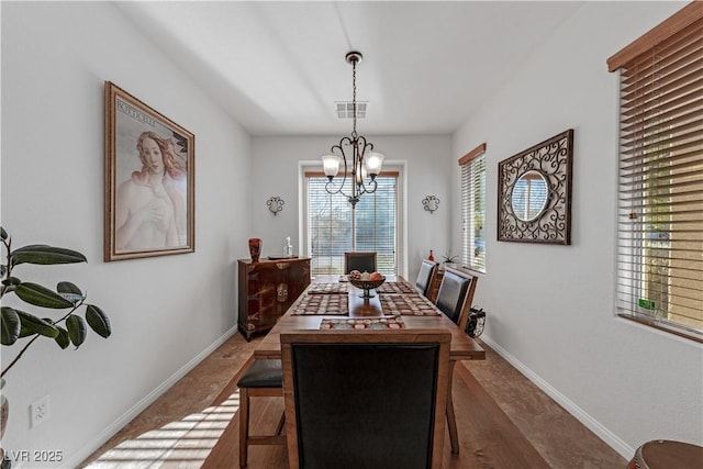 dining room with an inviting chandelier