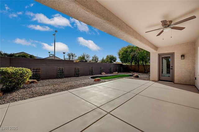 view of patio / terrace featuring ceiling fan