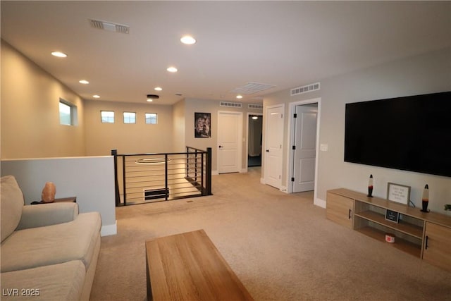 living room featuring light carpet