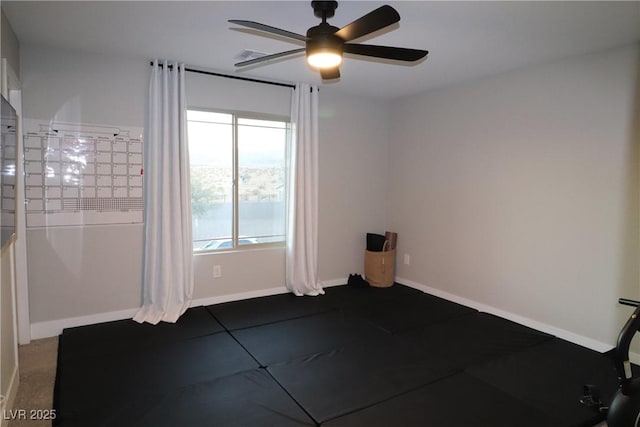 unfurnished room with ceiling fan