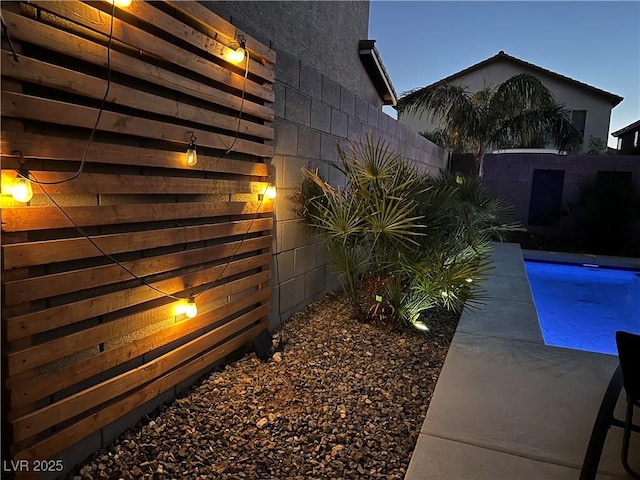 view of side of home featuring a patio area