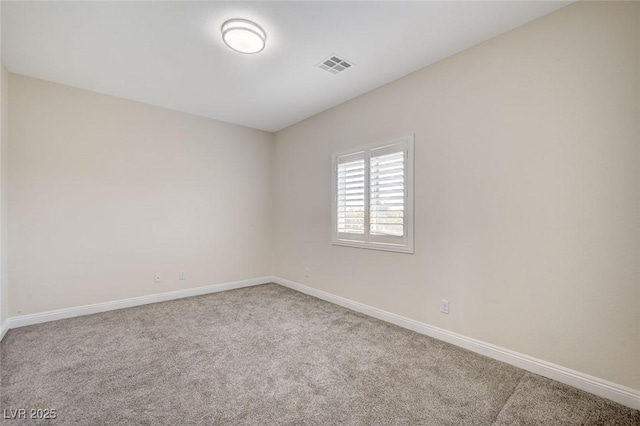 empty room with carpet flooring