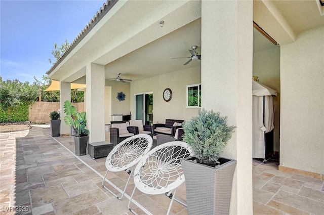 view of patio / terrace featuring ceiling fan and an outdoor hangout area