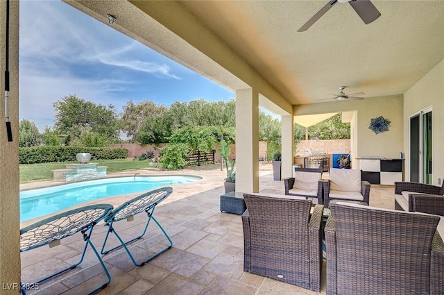 view of patio with ceiling fan, a fenced in pool, and an outdoor hangout area