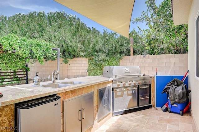 view of patio with grilling area and exterior kitchen