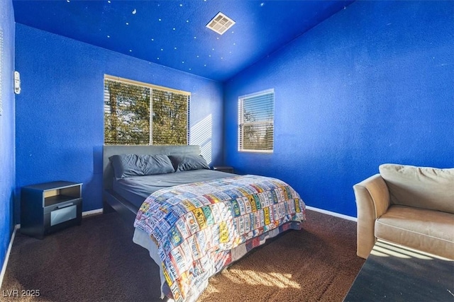 bedroom featuring carpet floors and vaulted ceiling