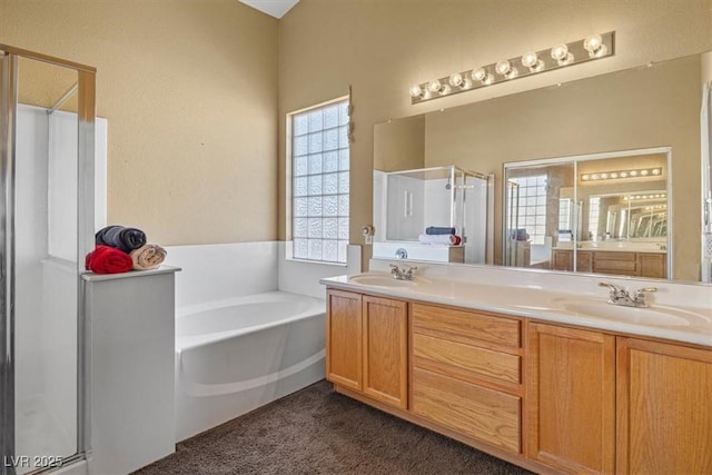 bathroom with plus walk in shower and vanity