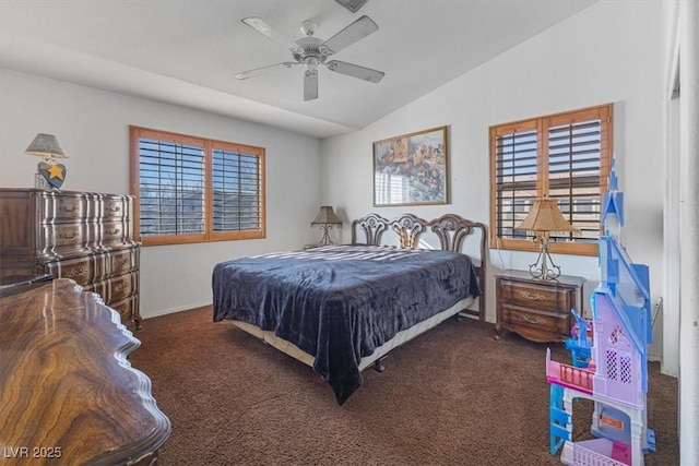 carpeted bedroom with ceiling fan and lofted ceiling