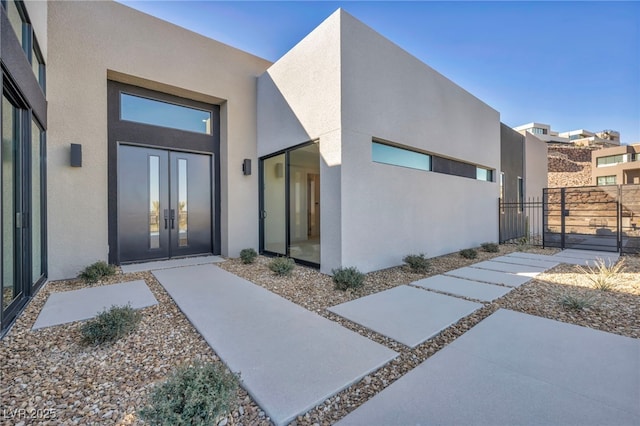 property entrance featuring french doors