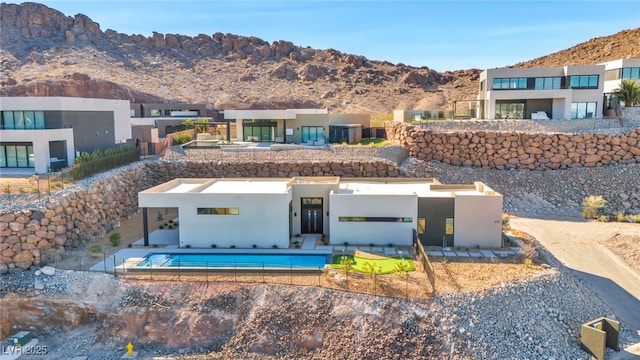 back of house featuring a mountain view