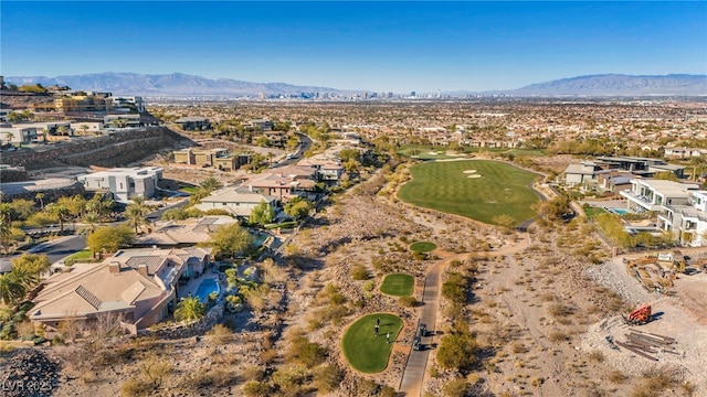 birds eye view of property featuring a mountain view