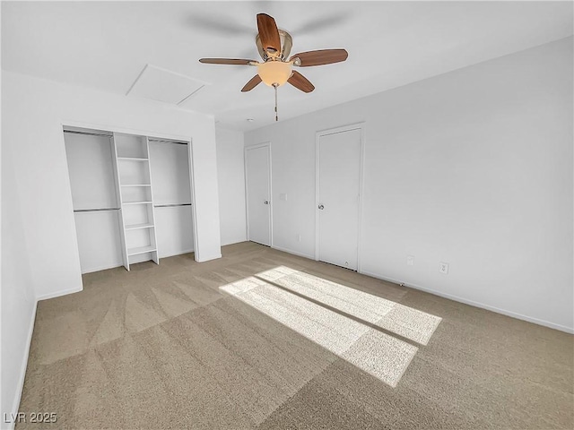 unfurnished bedroom with light carpet and ceiling fan