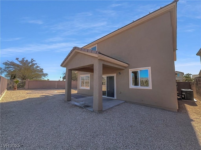 rear view of property with a patio area