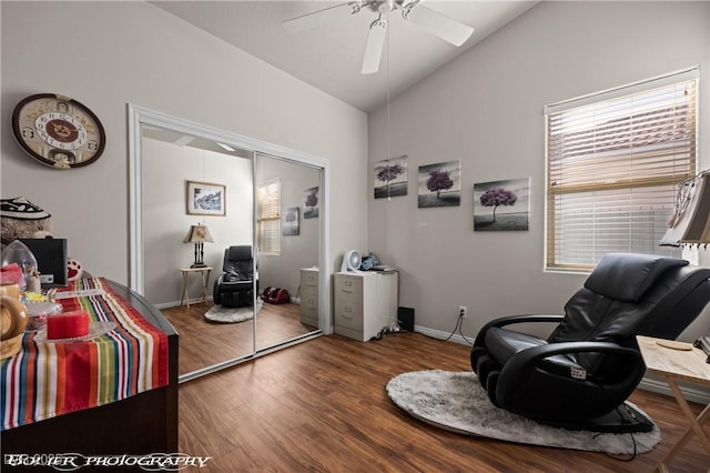 sitting room featuring lofted ceiling, wood-type flooring, and ceiling fan