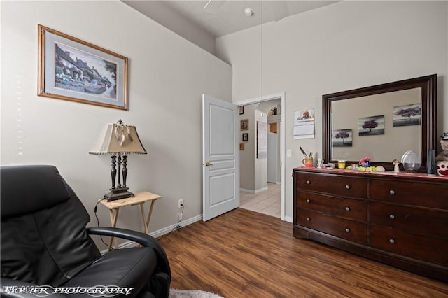 living area with light hardwood / wood-style flooring