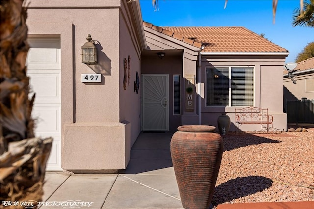 property entrance featuring a garage