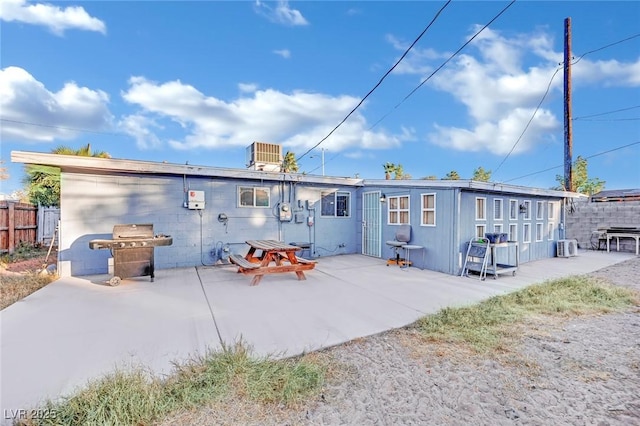 back of property with a patio area