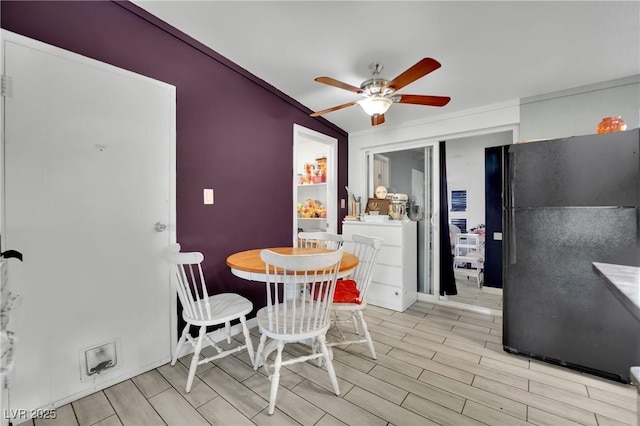 dining area with ceiling fan and lofted ceiling