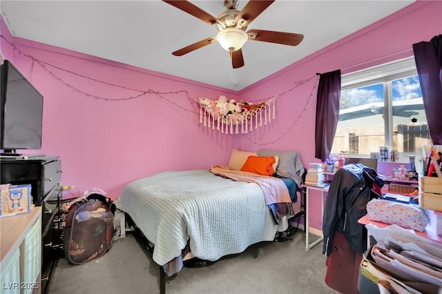 bedroom featuring ceiling fan and light colored carpet