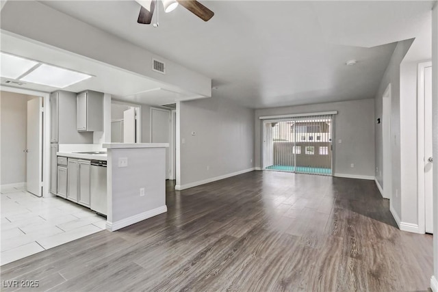 kitchen with ceiling fan, dishwasher, gray cabinets, and light hardwood / wood-style flooring