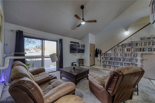 3791 Desert Marina Dr Unit 118, Laughlin, NV 89029 - carpeted living area featuring ceiling fan, lofted ceiling, and a textured ceiling