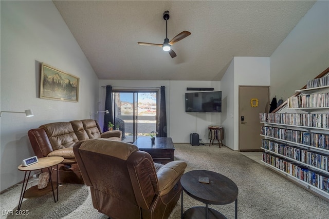 carpeted living room with a textured ceiling, ceiling fan, and lofted ceiling