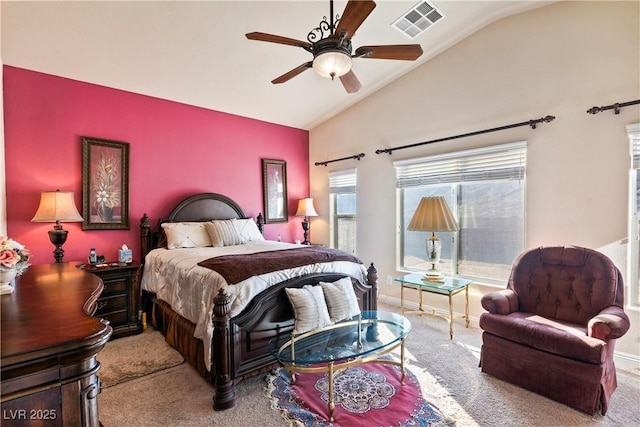 bedroom with ceiling fan, light colored carpet, and lofted ceiling