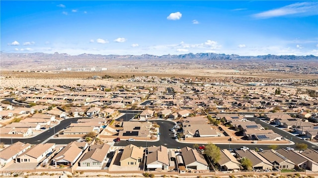 drone / aerial view featuring a mountain view