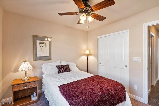 carpeted bedroom with a closet and ceiling fan