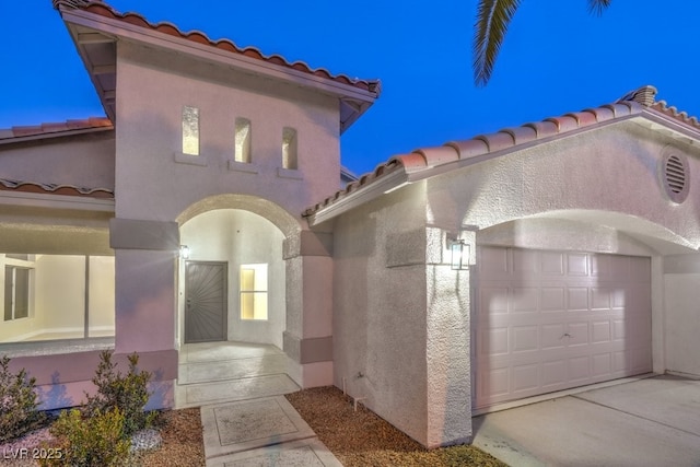 exterior space with a garage