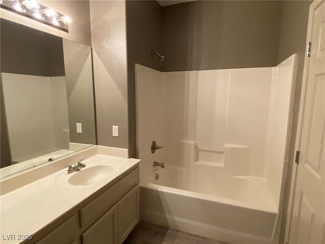 bathroom featuring vanity and shower / washtub combination