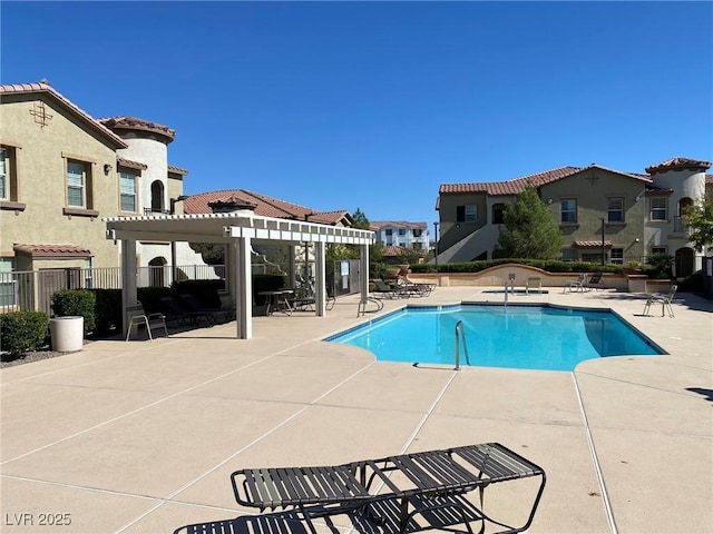 view of pool featuring a pergola and a patio area